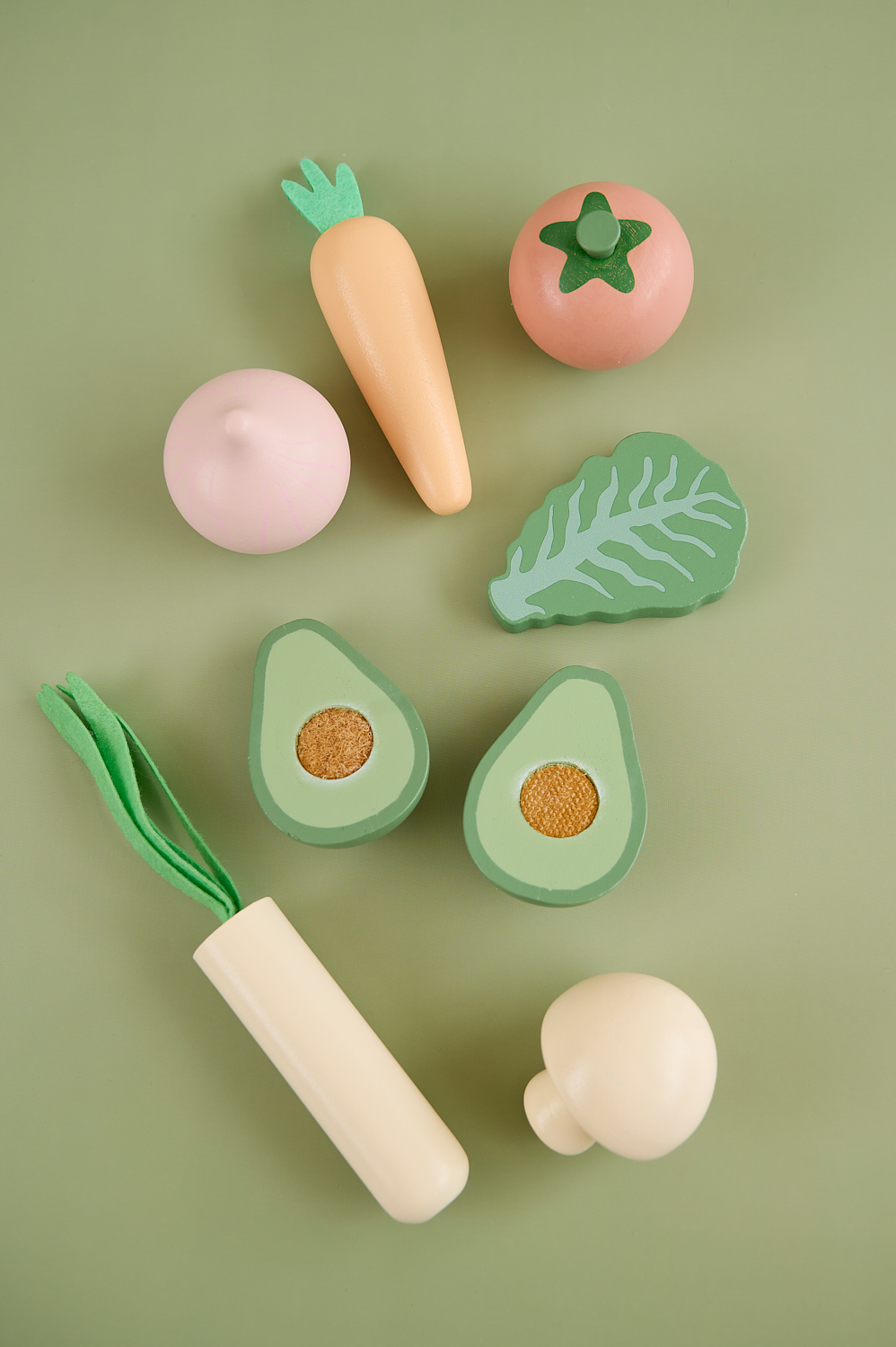 Wooden vegetables in bag